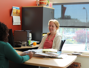 Assistant Professor, Chemistry, Dr. Tabitha Wood meets with a student in her new science complex office, August 24, 2011