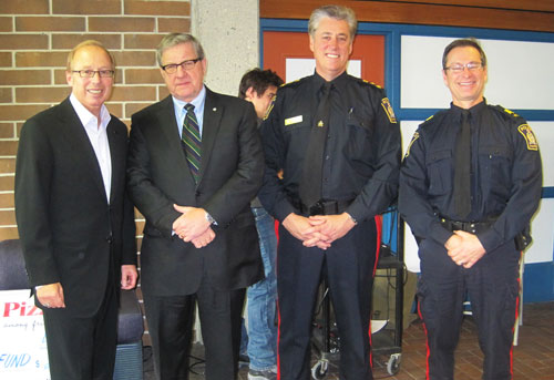 The individuals taking part in today's announcement included (from left to right) His Worship Mayor Sam Katz, UWinnipeg President & Vice-Chancellor Dr. Lloyd Axworthy, Winnipeg Police Service Chief Keith McCaskill and Winnipeg Police Service Staff Sargeant Bud Guest. Photo by: Sharon Leonard / uwinnipeg.ca