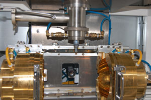 Inside an image furnace. A video camera is built into the instrument, as seen in the middle of the photo, so the scientist can record the crystal as it grows.