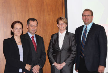 Claudia Sanchez Bajo (Chair in Cooperative Enterprises), Mikel Lezamiz (Director at the Mondragon Cooperative Corporation), Karen Harlos (Chair, Department of Business and Administration), Peter Bjornson (Hon Minister of Housing and Community Development, MLA)