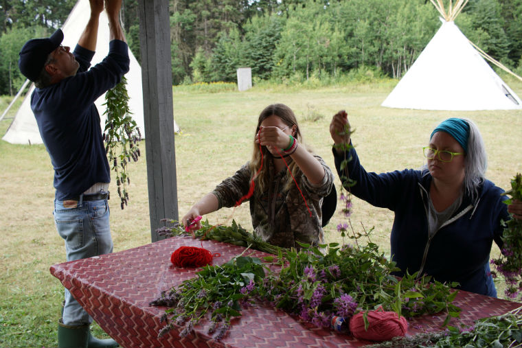 Students prepare and dry medicine Aug 2017 – photo by student Donna Kurt