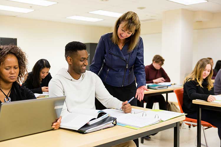teacher with students in classroom