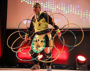 Brian Clyne, a member of the Peguis First Nation and an award-winning hoop and traditional dancer performs the opening act at UWinnipeg's eighth annual PACE Cultural Evening.