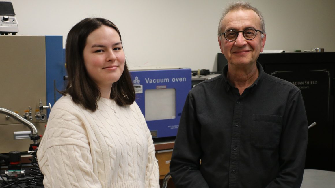 Tegan Ledoux and Dr. Ed Cloutis standing in his research lab.