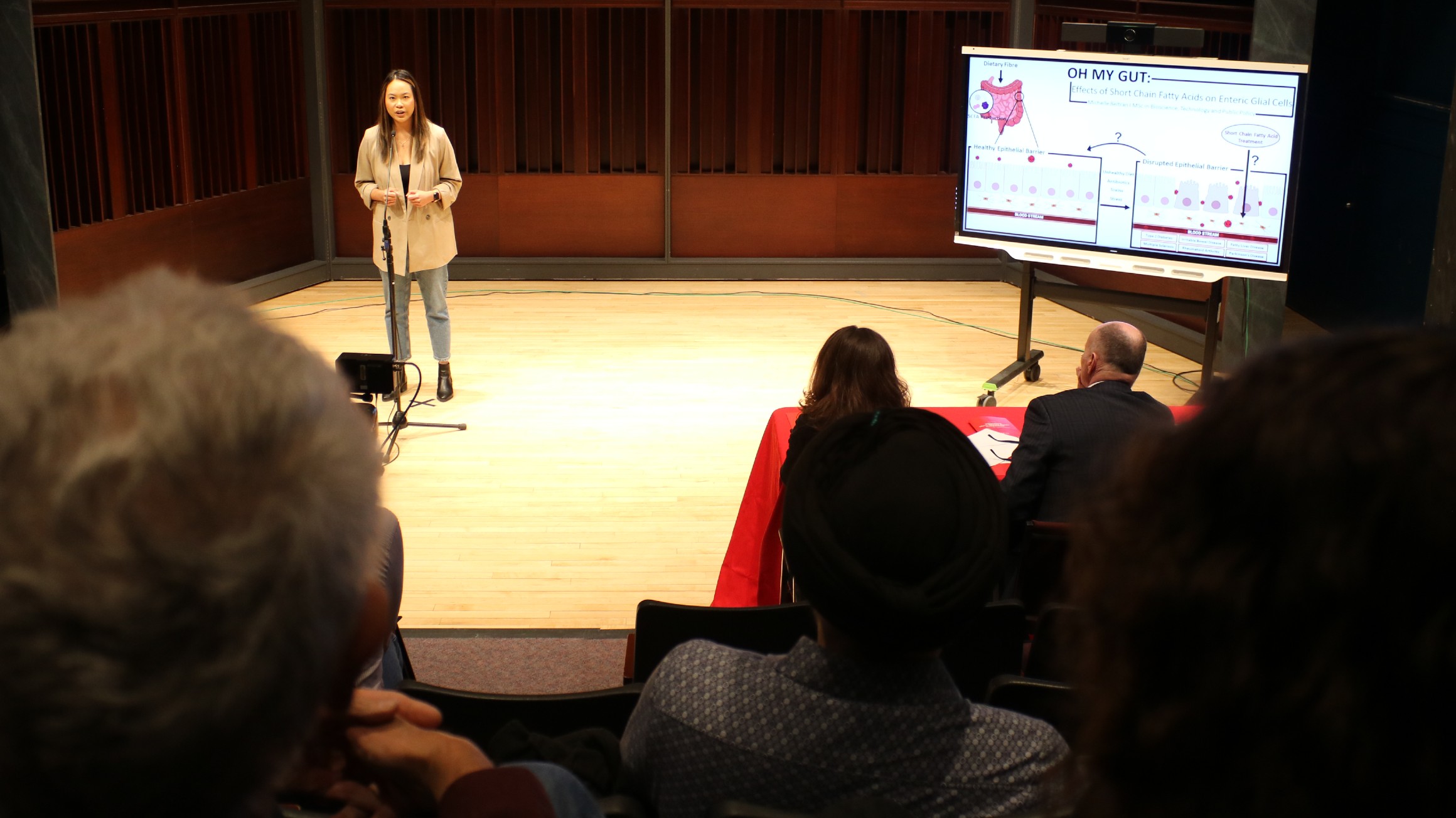 Michelle Beltran presenting at the 3MT Competition