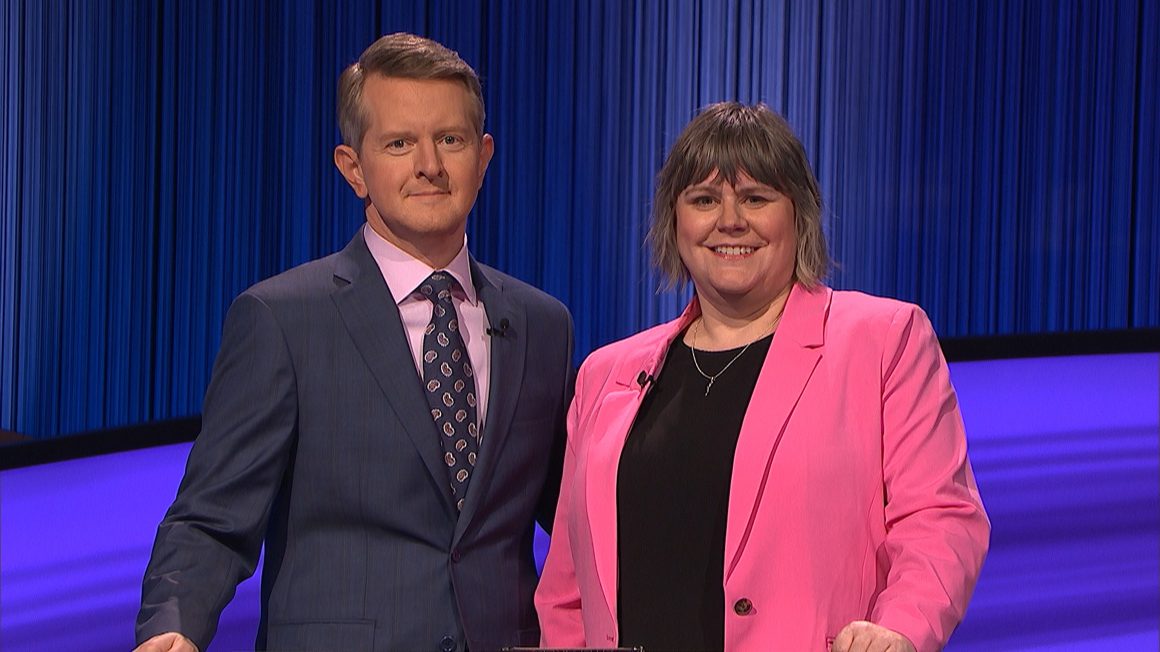Jeopardy! host Ken Jennings with Emma Hill Kepron on the set of the show.