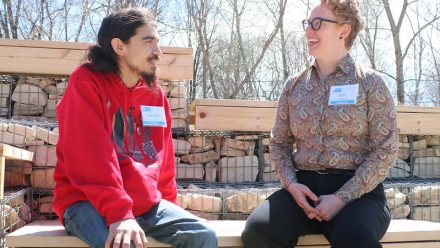 Sheldon Valiquette chats with Dr. Julie Chamberlain at The Forks. 