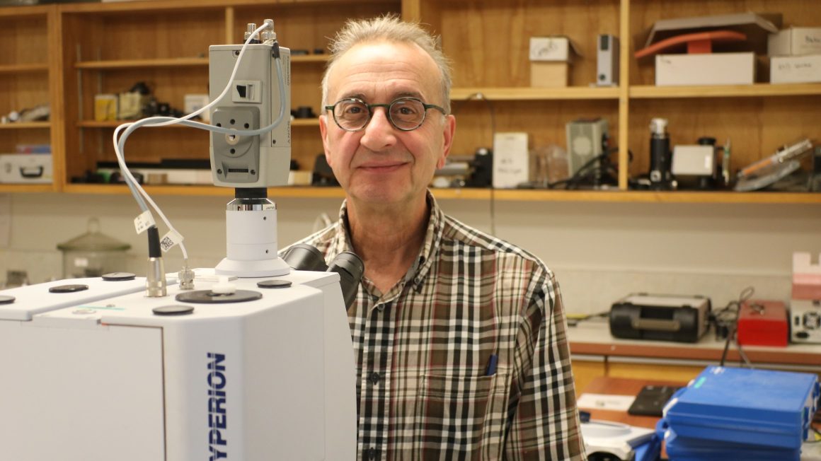 Dr. Ed Cloutis with a spectroscope in his lab.