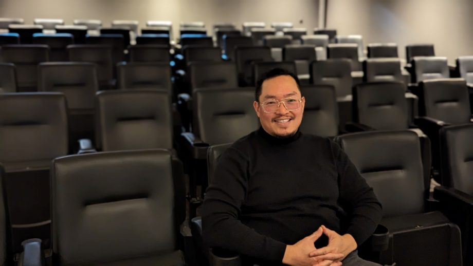 Alan Wong sitting in movie theatre