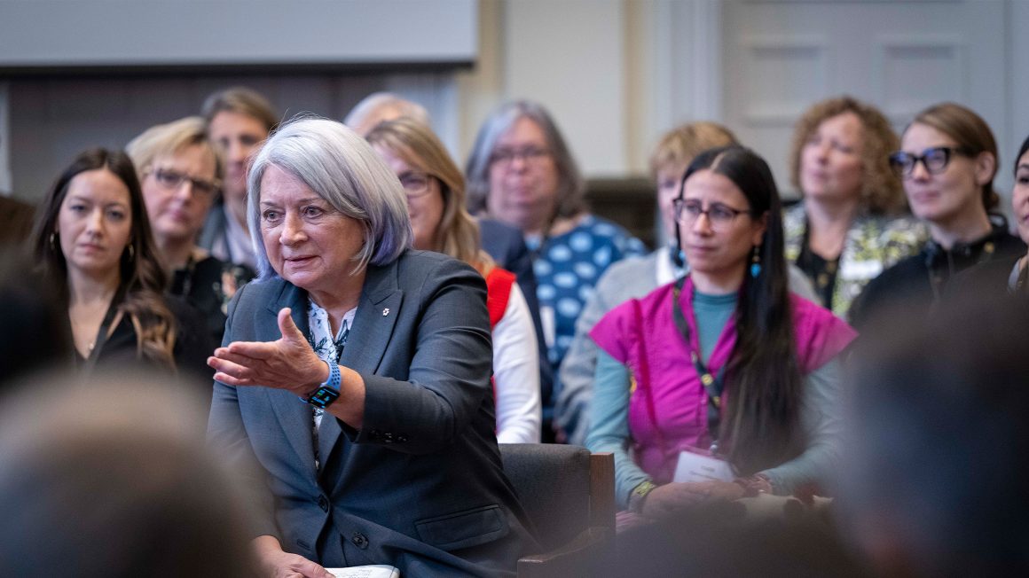 Govenor General Mary Simon speaking sitting in a circle speaking.