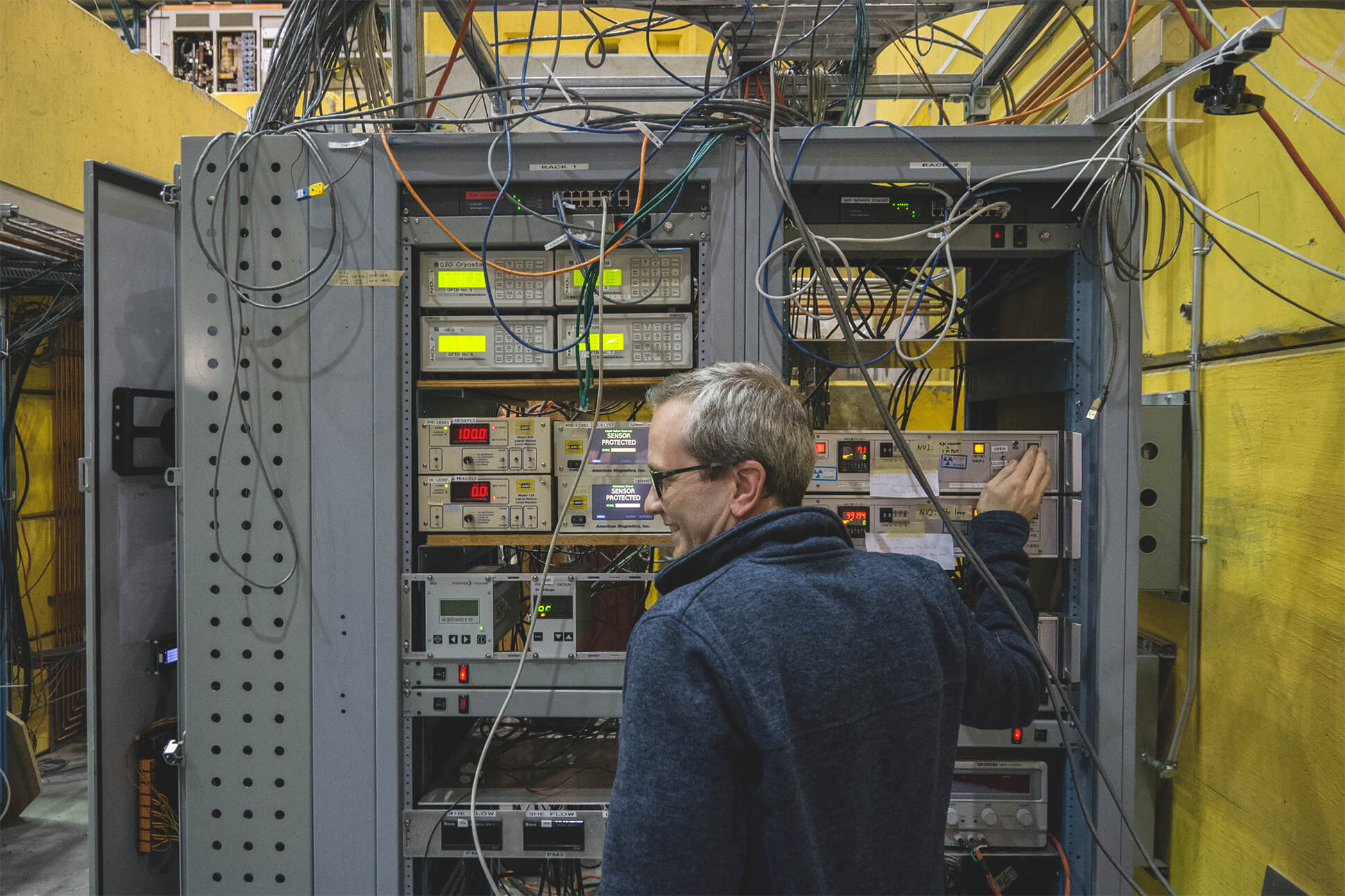 Person in front of electronic equipment