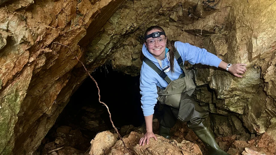 student inside a cave