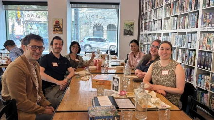 People aitting at a table.