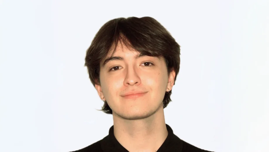 Headshot of Caleb White with a grey background