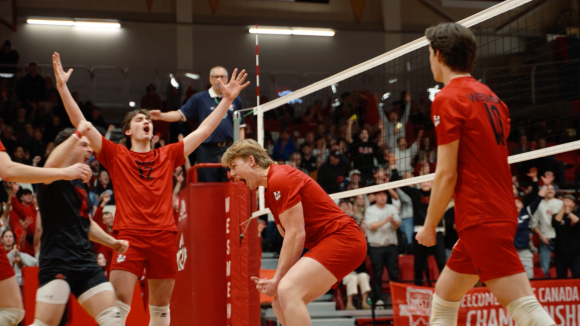 Wesmen Men's Volleyball team celebrates