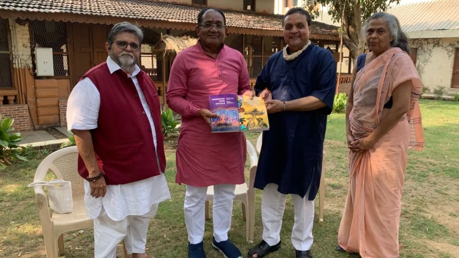 L-R) Dr. Harshad Patel, Vice Chancellor, Dr. Nimisha Shukla, Professor, Rural Economics, Dr. Shailesh Shukla, and Gujarati writer and poet Bhadrayu Vacchrajani pose outdoors.
