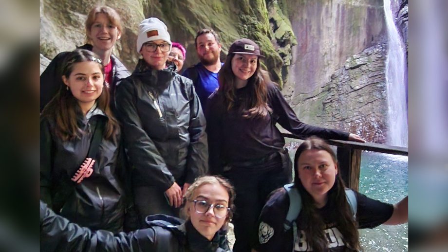 A group of students in a cave in Slovenia.