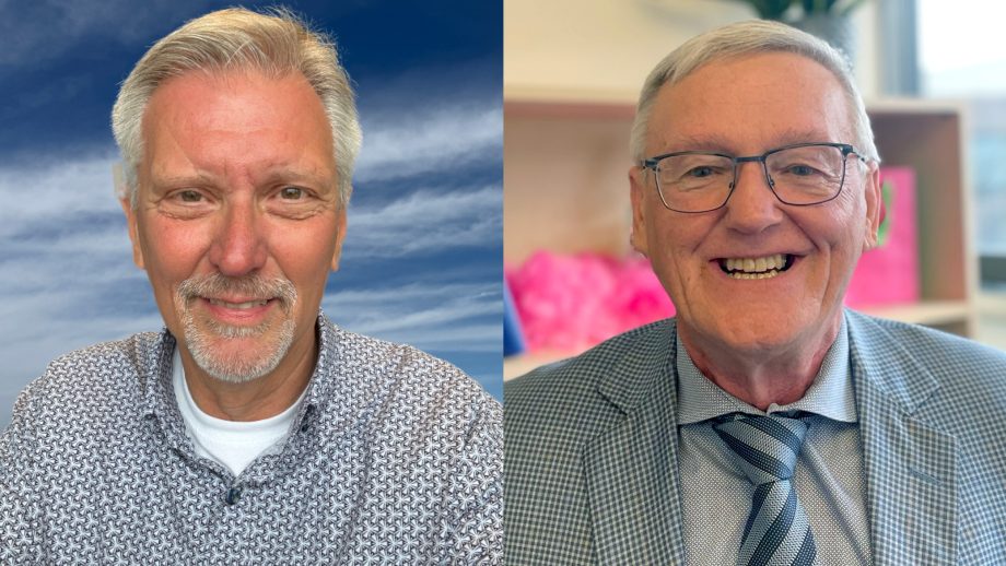 Dr. Danny Blair in a grey shirt and Dr. Michael Weinrath in a grey suit.
